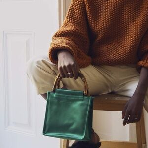 Hai 100% green satin silk cutch with bamboo handles